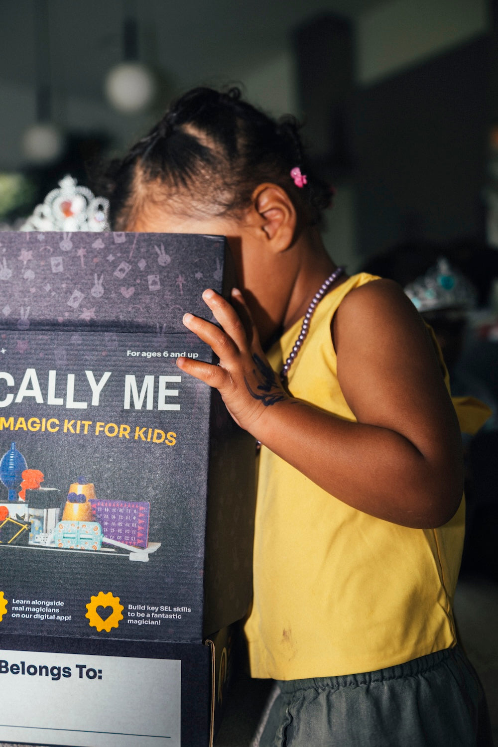 A child with the Magically Me kit